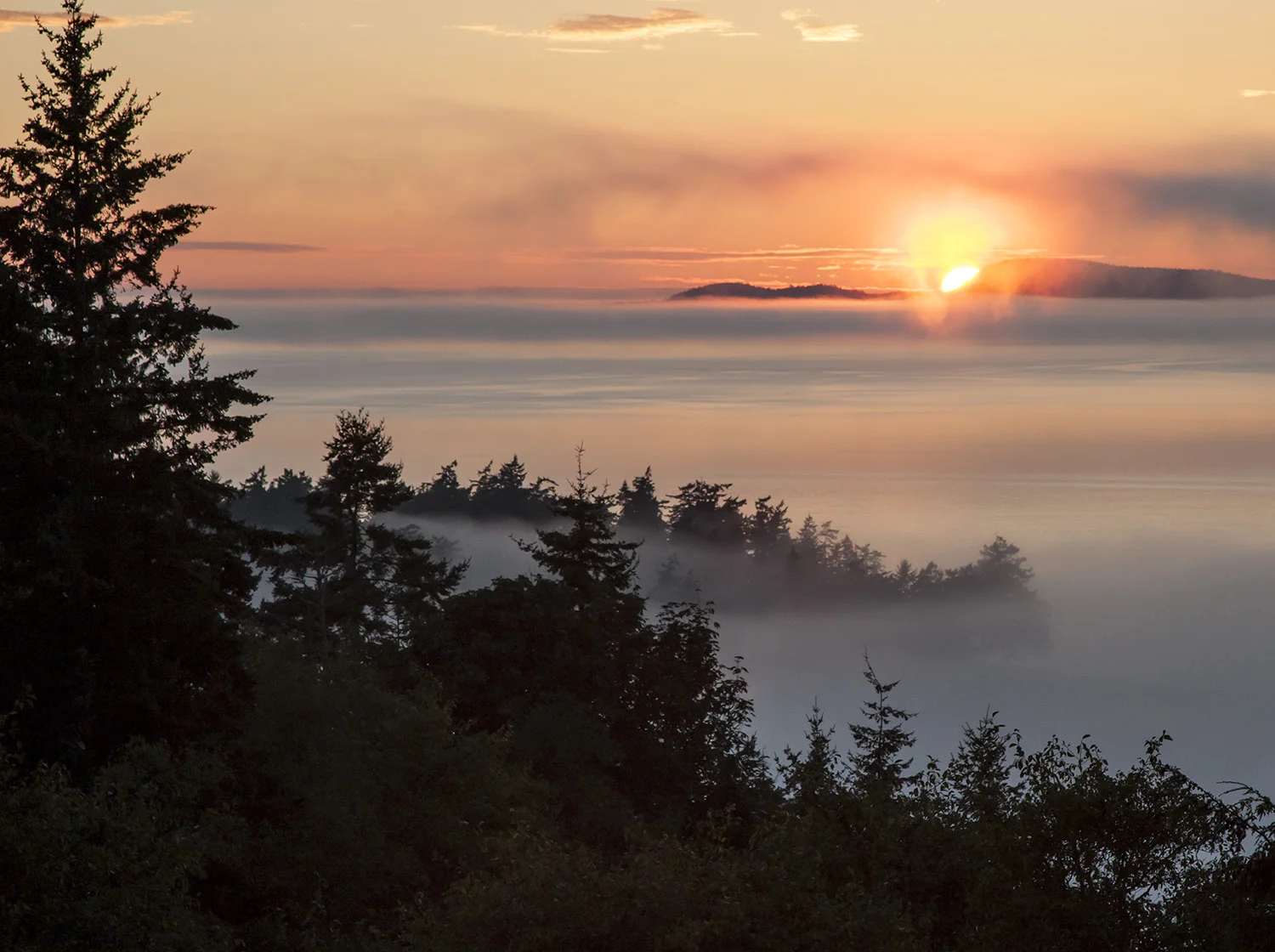 Sunset over San Juans - Copyright 2014 Marcia Neu