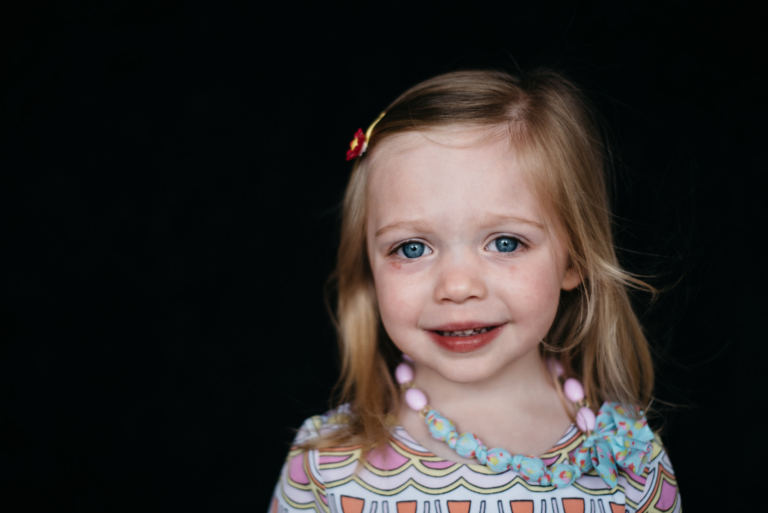 What are fine art school portraits all about? Put simply, they are classic, timeless portraits of children that parents will cherish! Let's redefine school portraits! Out with the old, boring, stiff, cheesy smiles. In with natural, realistic, beautiful expressions. The day of shooting: I bring all equipment needed for the shoot. How do we order? All ordering will be done online from a password protected gallery. Each parent will be provided with 2-5 images of their student in color and black and white. Prints and products are high quality, and will be hand delivered to the school. Pricing: My photos are competitive in price with the bigger companies. Nothing is due upfront, you don't have to order anything until you see your photos. What's in it for you?? I will donate 10% of my profit back to your school! That's right, 10%!