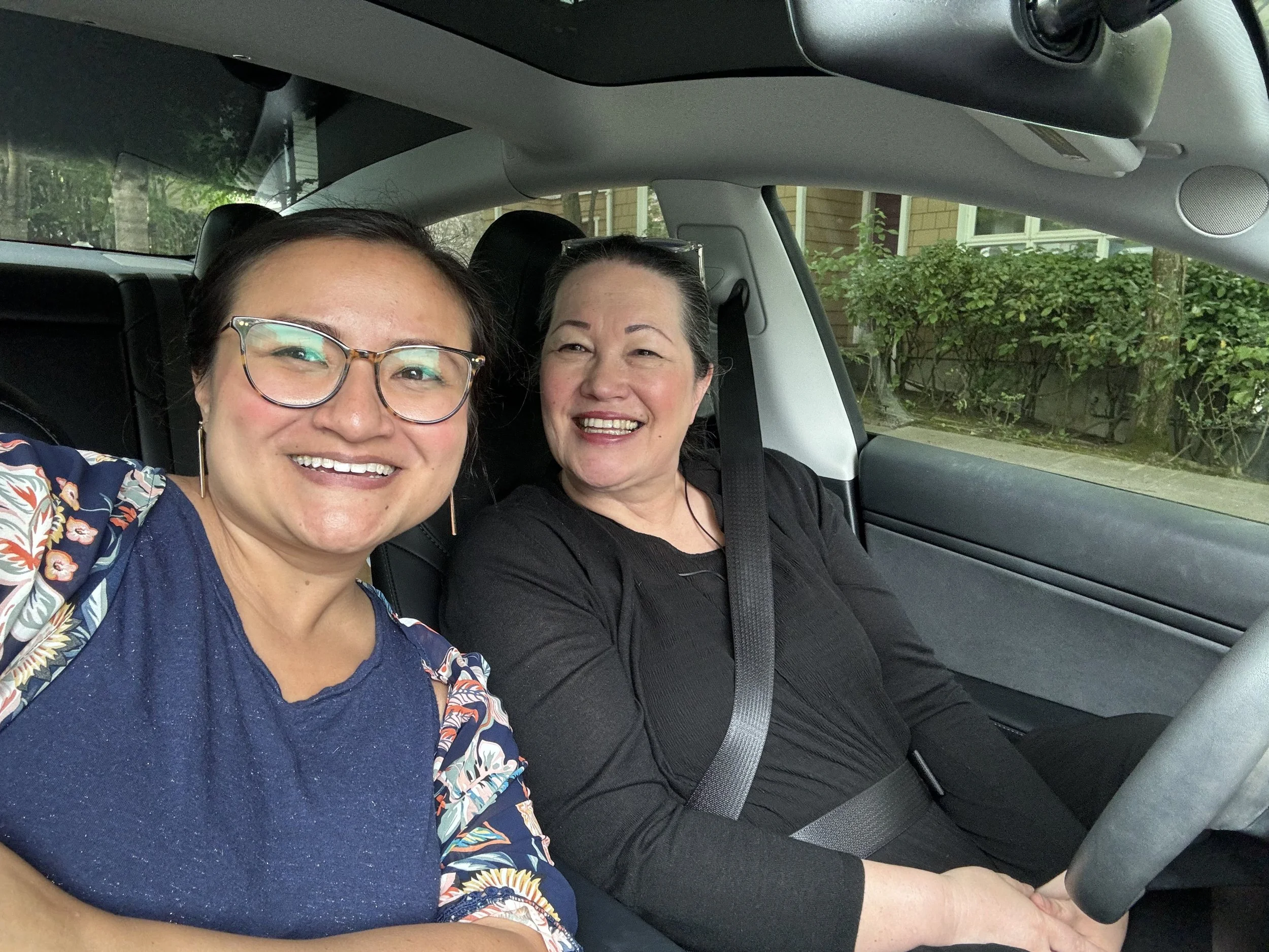 Alyssa Christensen and Diane Terry smiling together for a selfie in a car.