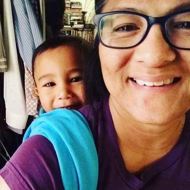 Someone has a fever and only a #WovenWrap would do. Pretty much since birth this kid has preferred buckle carriers and ring slings. In fact, he asked for a ring sling but changed his mind when I said I couldn't use it for my back.

This is a Dolcino 