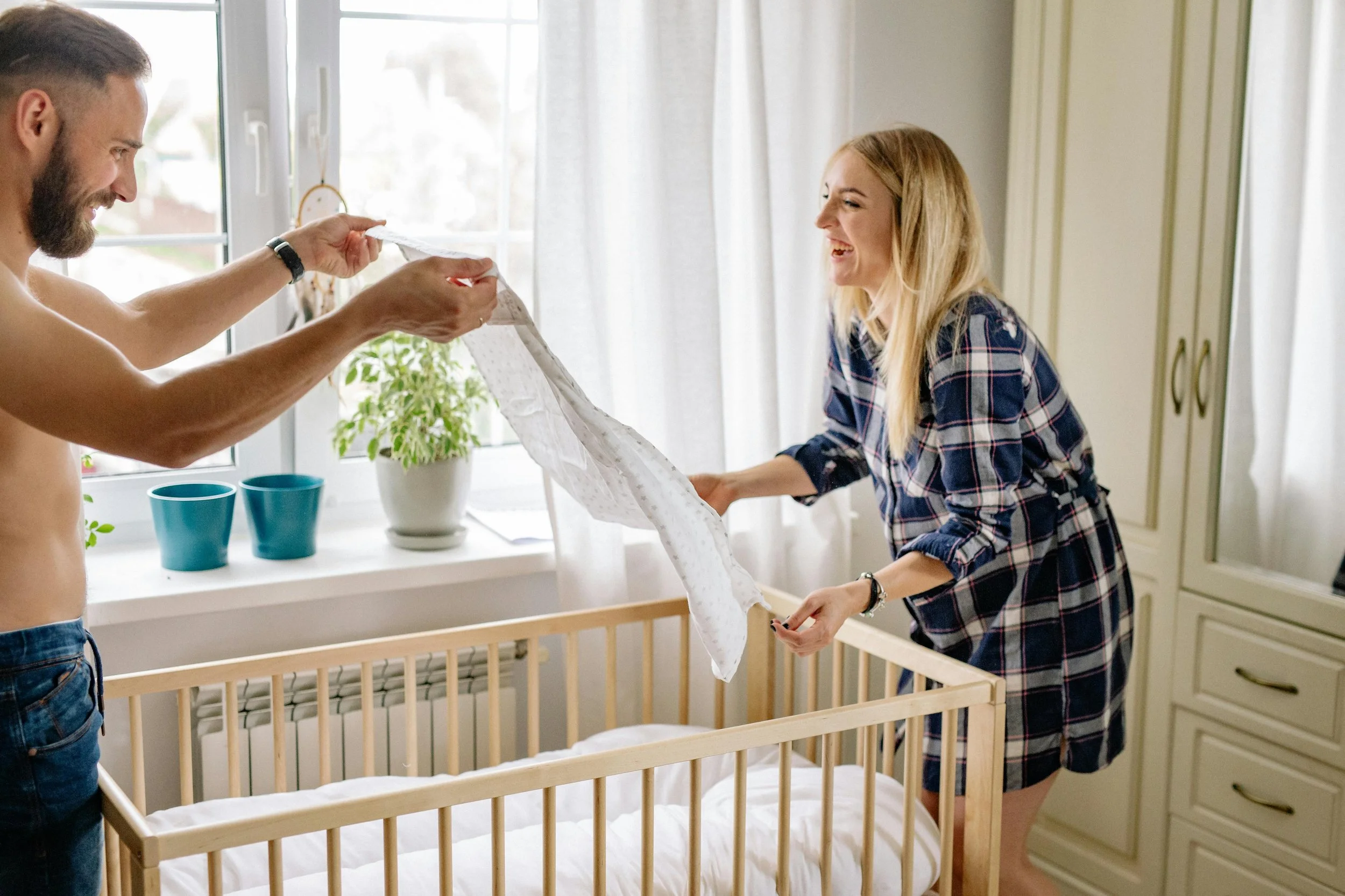 Preparing the baby's crib together