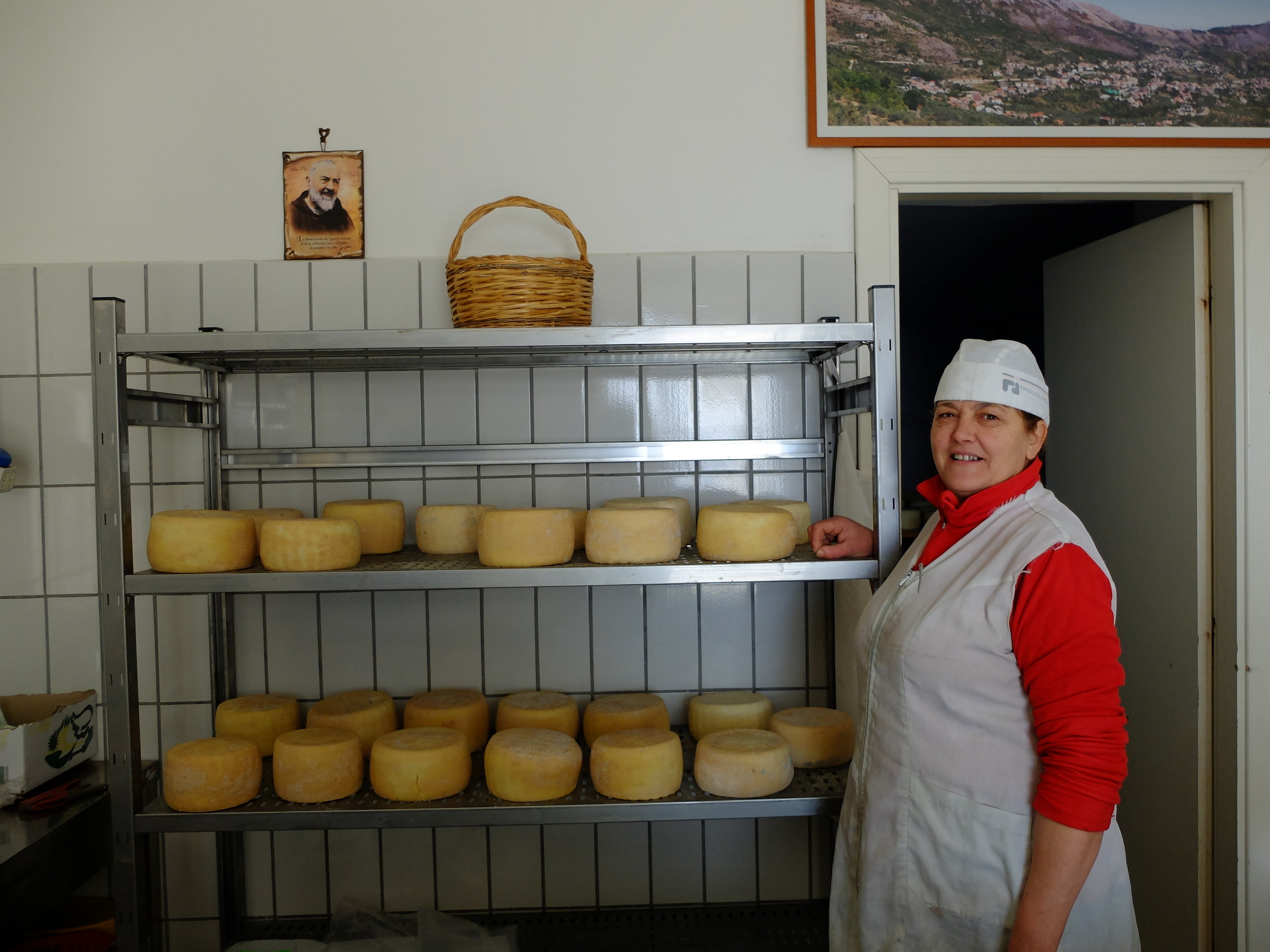 Immacolata proudly showing her cheeses