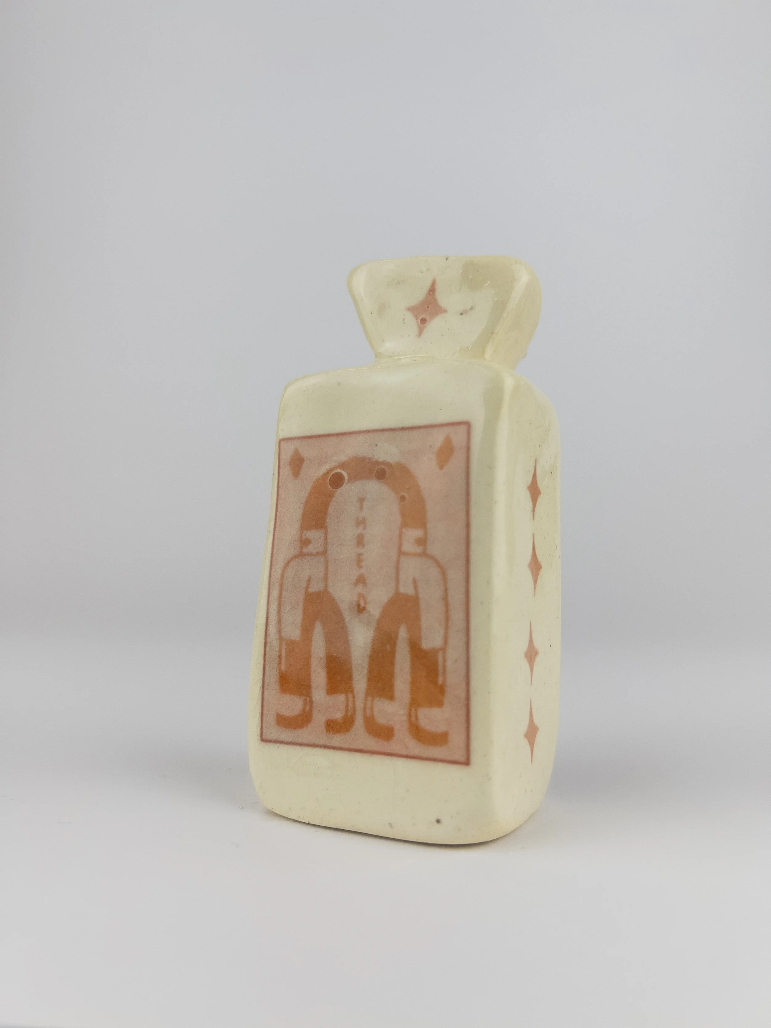 043 e linked by a thread.jpg