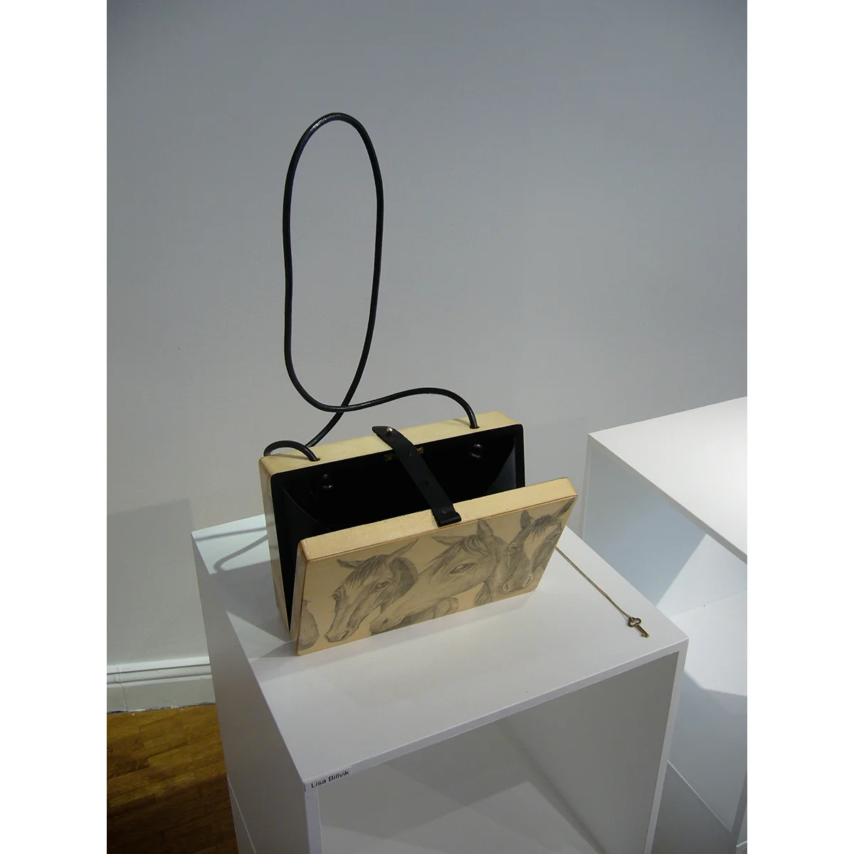  I swapped horses for fashion  Pencil drawings on a wooden box that can be carried as a handbag 