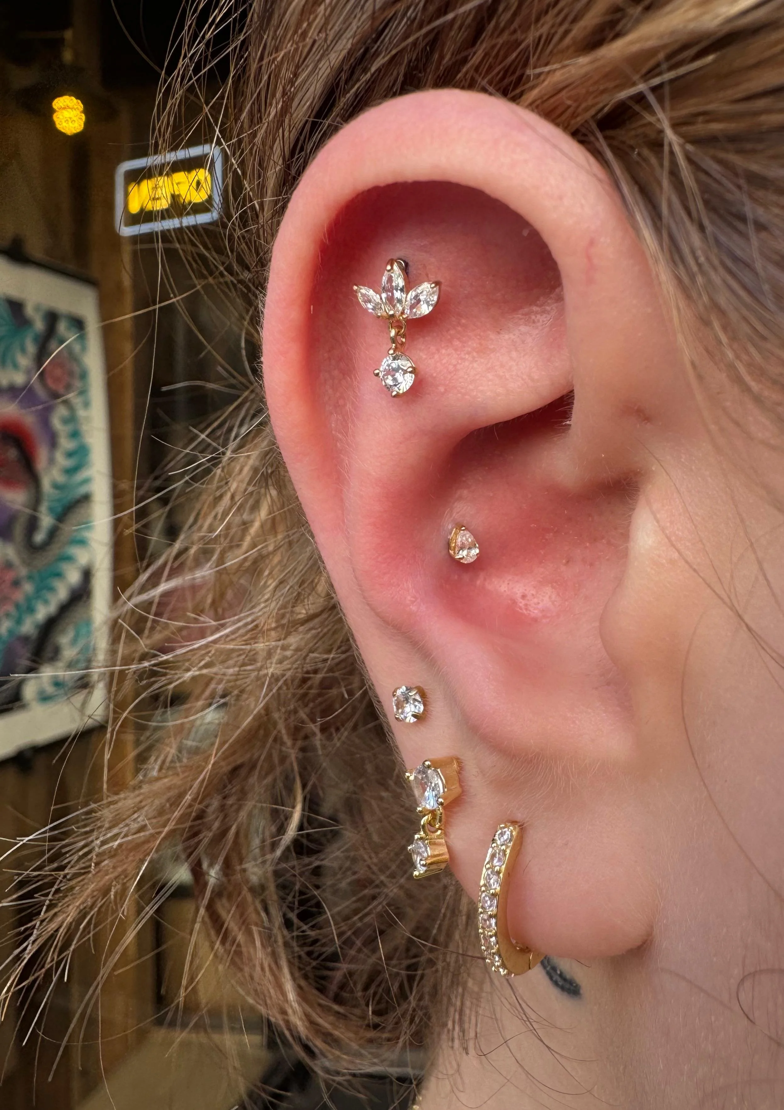 A 14K gold ear curation done at Kilburn Original