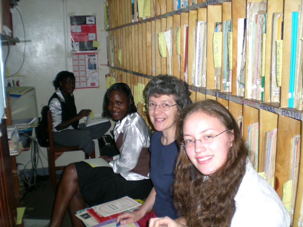 Karla, Bridget, Monicah and Maureen at work in the Kampala Music School Library. 