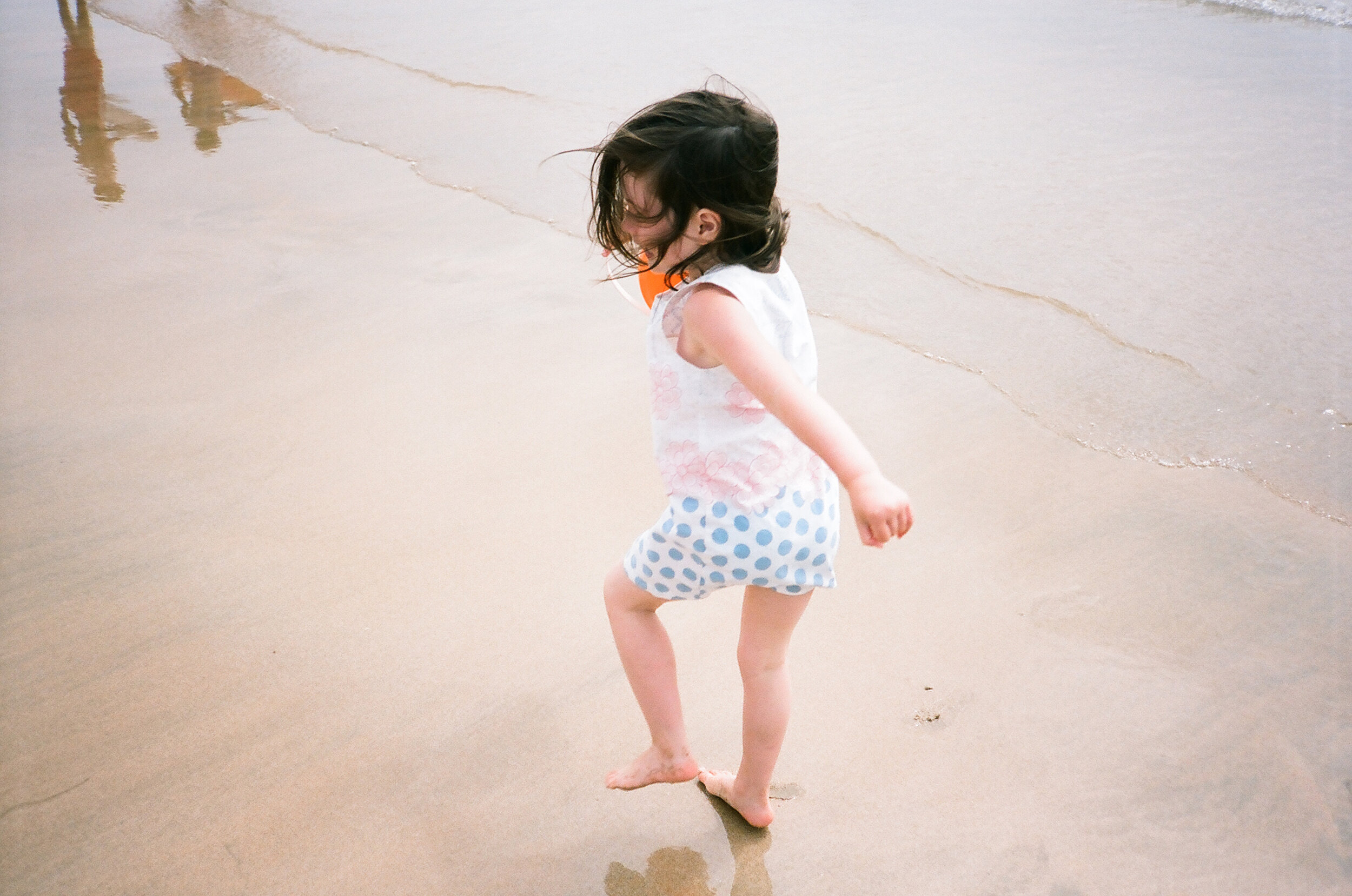 Madeline running on the beach ile d'yeu.jpg