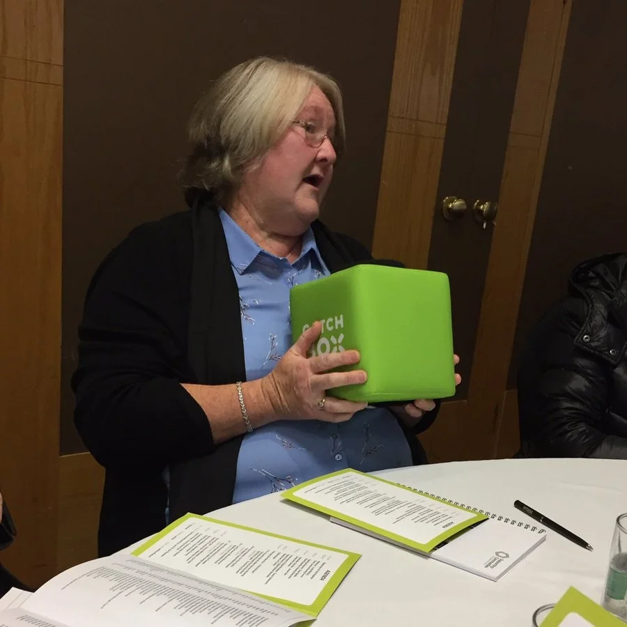 Conference delegate giving feedback after the breakout sessions