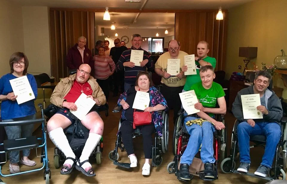 Group photo with certificates. Well done all!