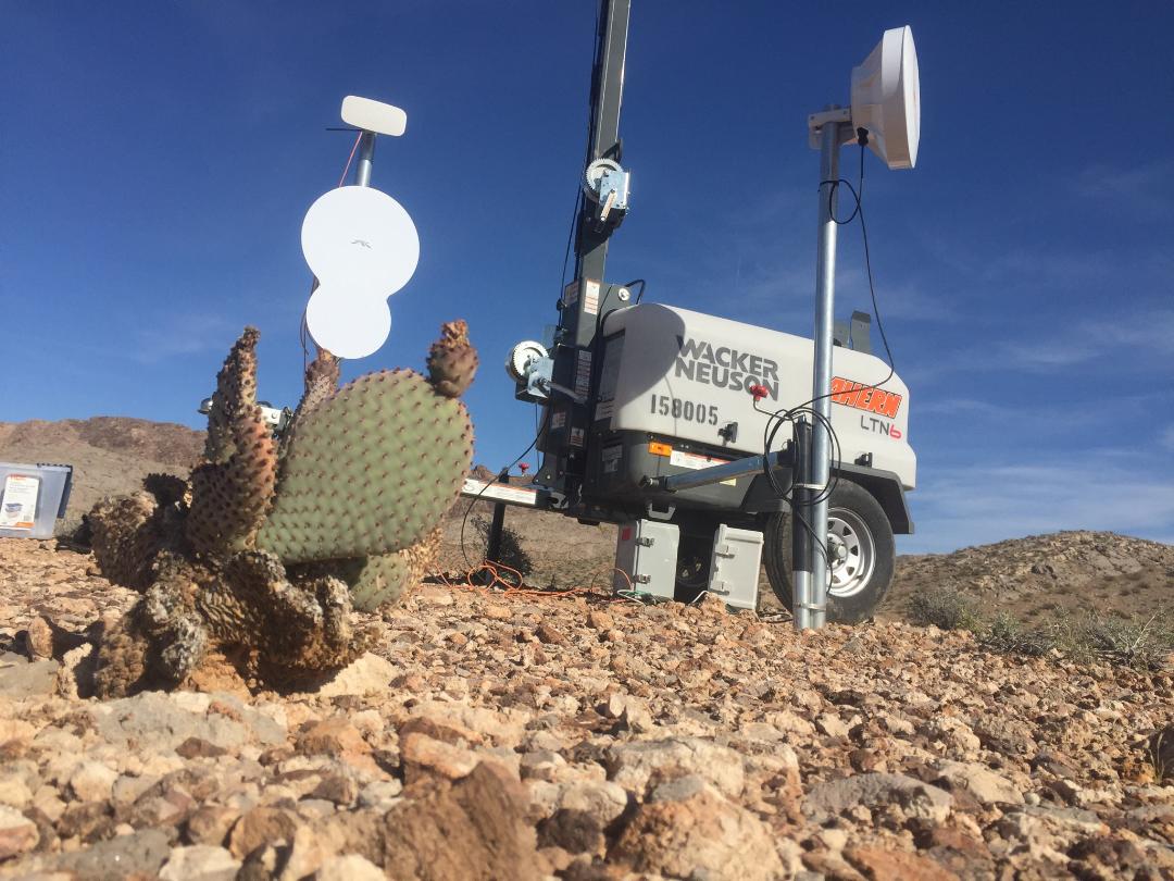 Internet receive site powered by a portable light generator