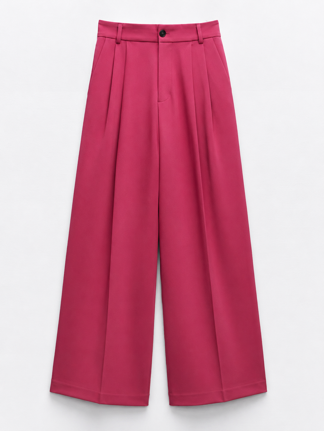 Pink wide-leg trousers with pleats, belt loops, and a button closure. /  E-Commerce Flat-Lay
