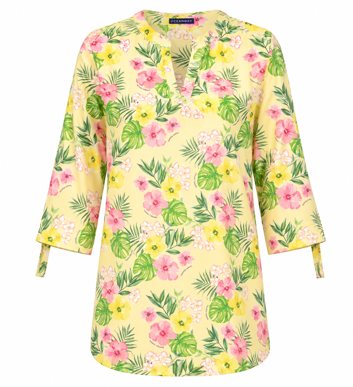 Yellow long-sleeve dress with pink, yellow, and white floral pattern and green leaves. / E-Commerce Ghost Mannequin