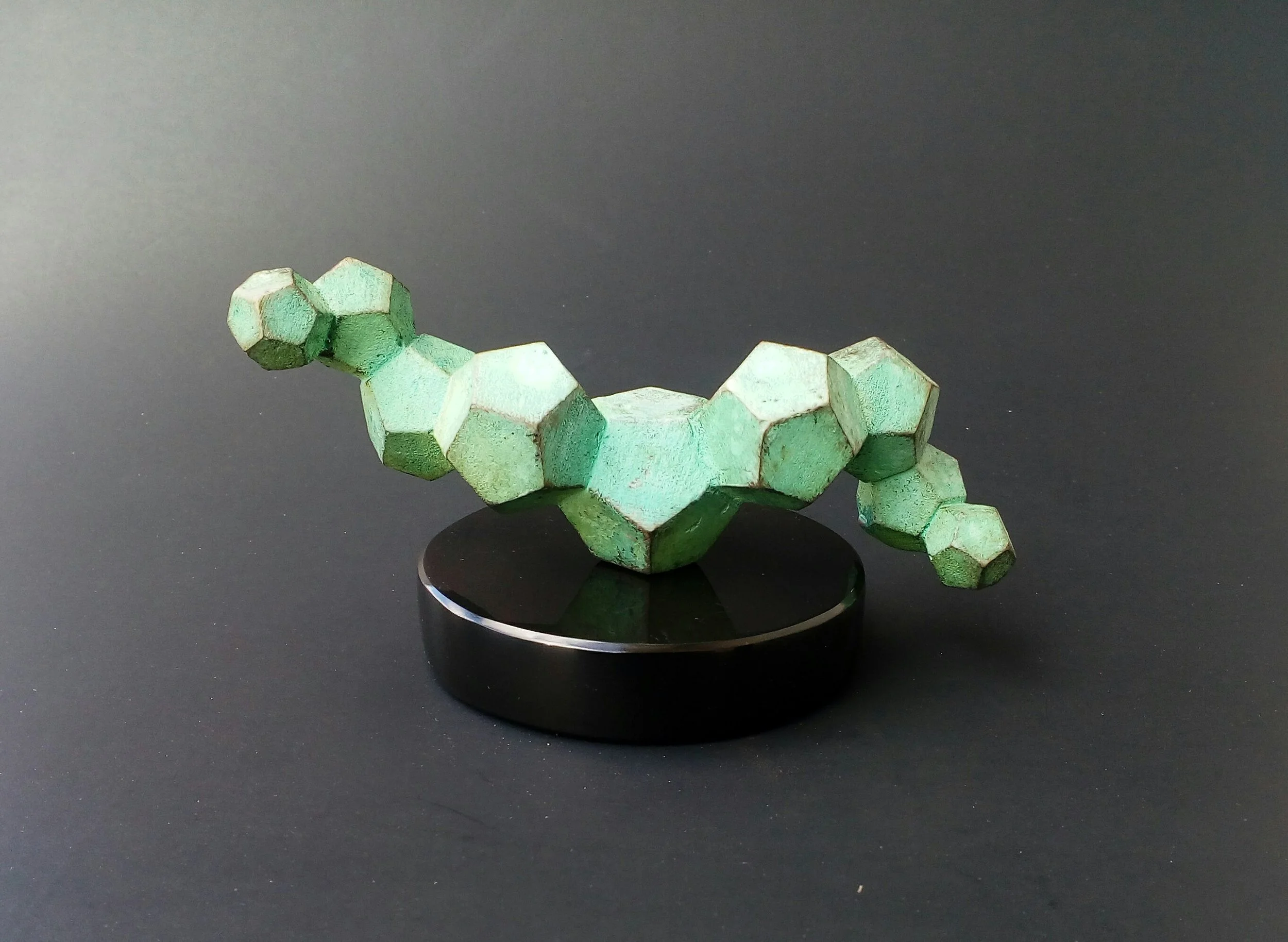 Dodecahedron Spiral on stone base