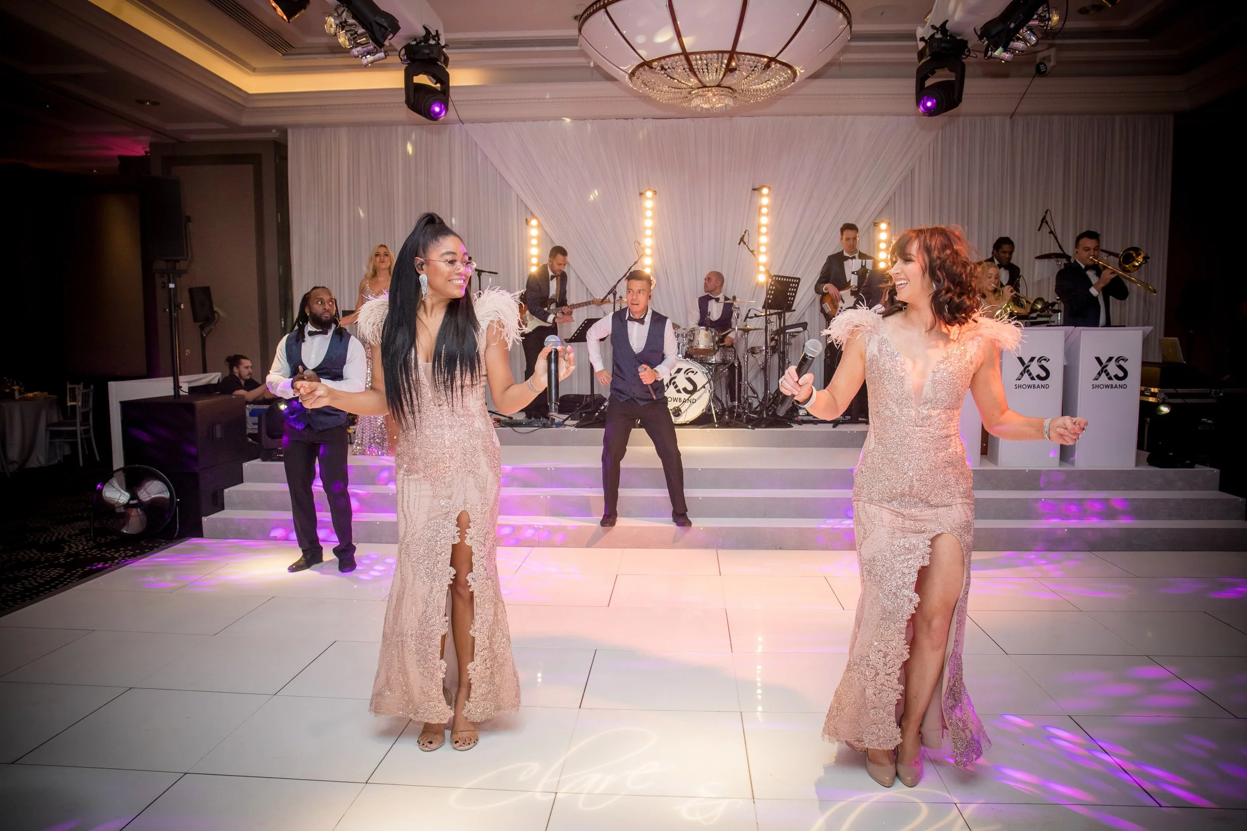 Singers on dance floor