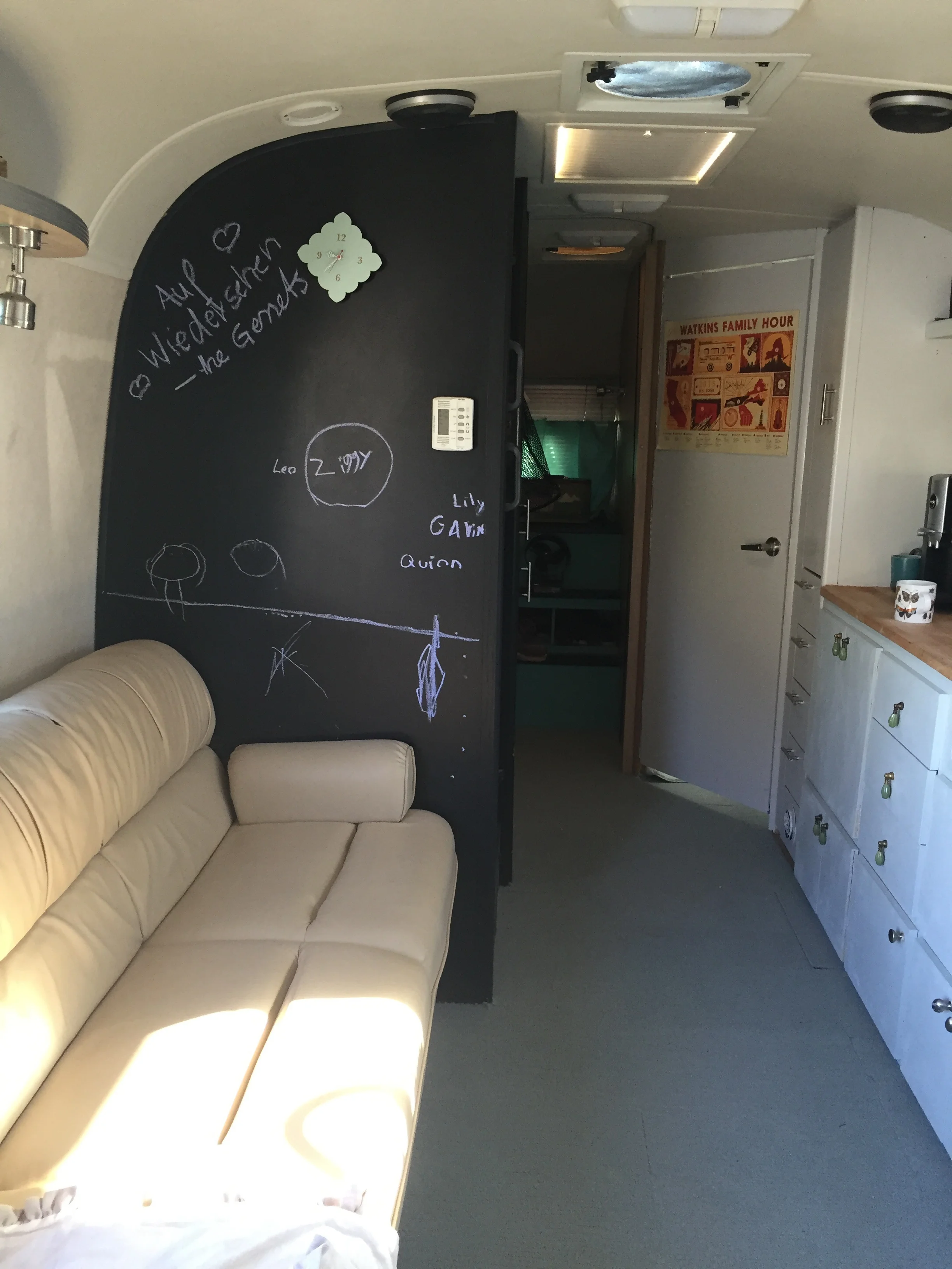 Chalk wall was a good call. (Thanks, Anna!) Kind of tacky couch pulls out to a double ish bed. It's soft and fabulous. 