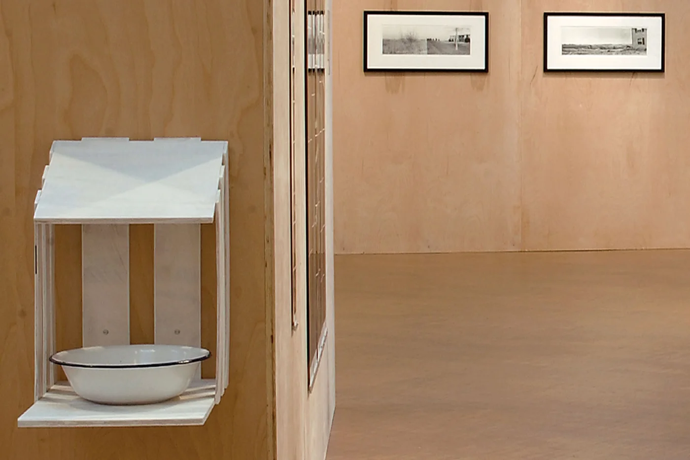 Exhibition view with Watering rack for hens
