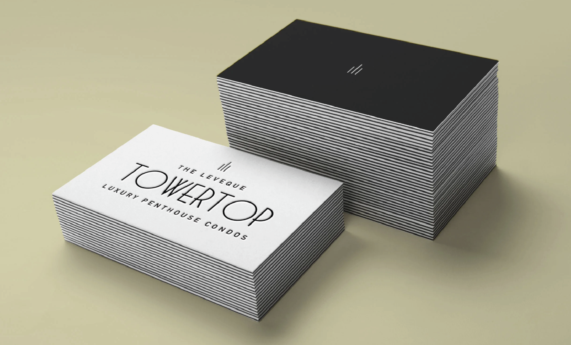 Business cards for luxury condos called The Leveque Towertop.