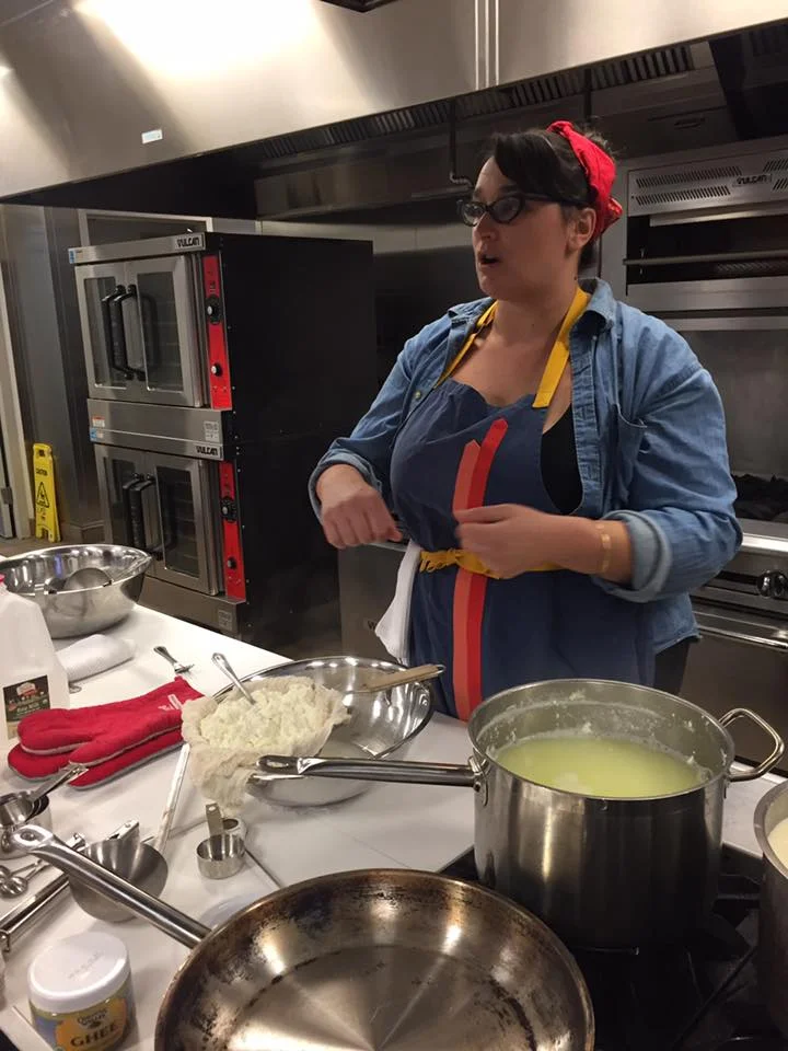Alex teaching a ricotta making class at the Free Library of Philadelphia Culinary Literacy Center .