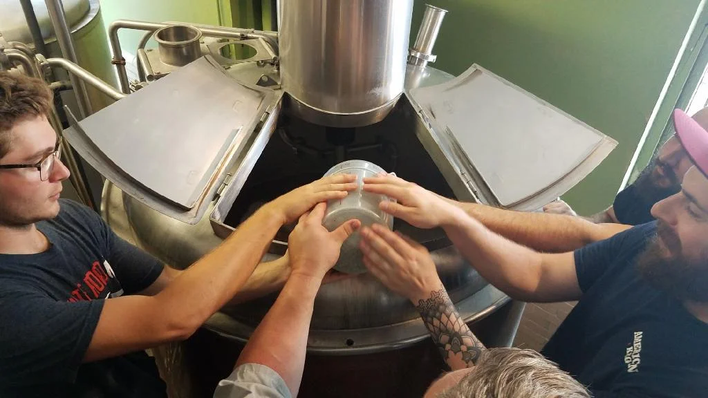 At Dock Street Brewery, adding in hops to the Philly batch.
