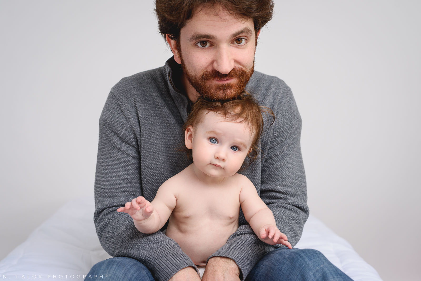 Like father, like daughter. Family photo session by N. Lalor Photography. Studio located in Greenwich Connecticut.
