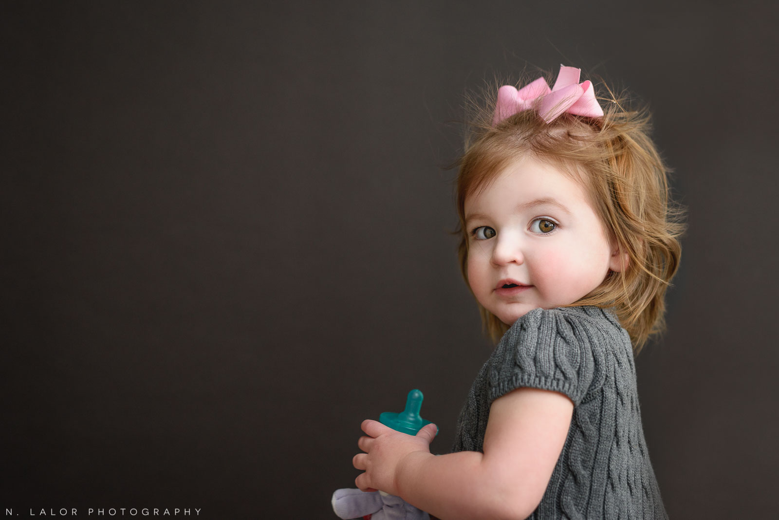 Lovely little girl. Maternity “Mom and Me” photo session by N. Lalor Photography. Studio located in Greenwich Connecticut.