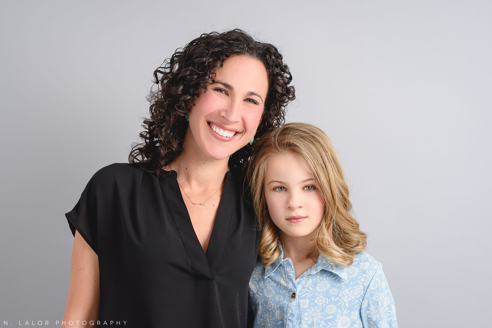Portrait of Mom and daughter. Studio family photoshoot with N. Lalor Photography in Riverside, Connecticut.