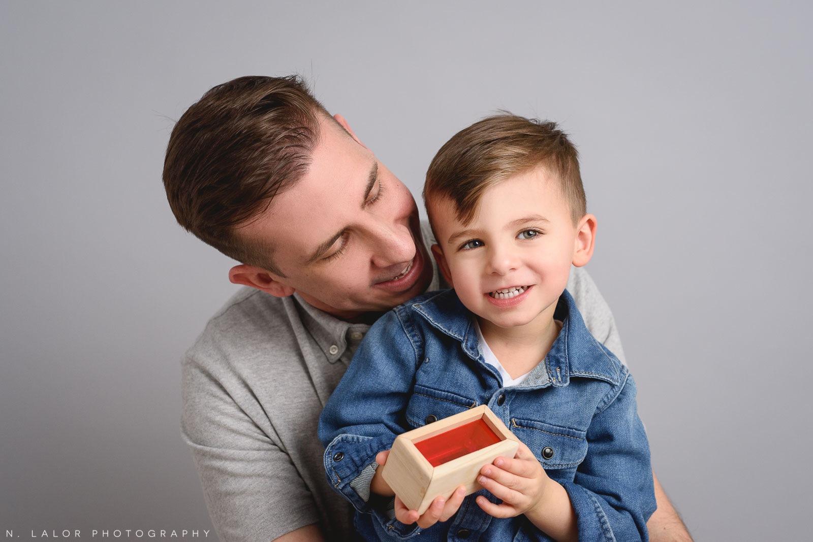 Dad with son. Maternity + Family studio photoshoot with N. Lalor Photography, Greenwich Connecticut.