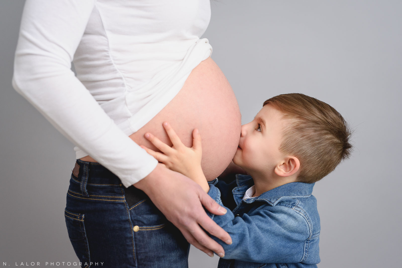Kissing the baby. Maternity + Family studio photoshoot with N. Lalor Photography, Greenwich Connecticut.