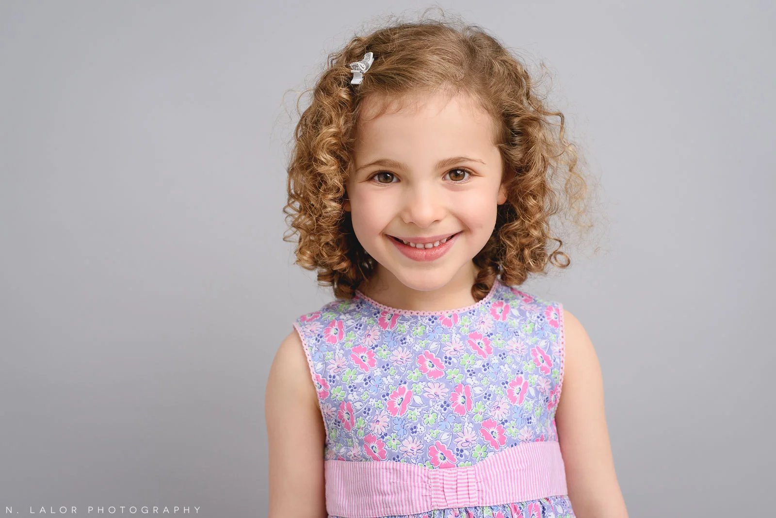 Big sister. Studio family photo session with N. Lalor Photography in Greenwich, Connecticut.