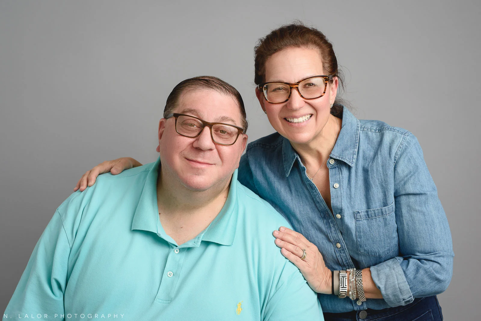 The parents. Teen family photo session with N. Lalor Photography. Greenwich, Connecticut studio photographer.