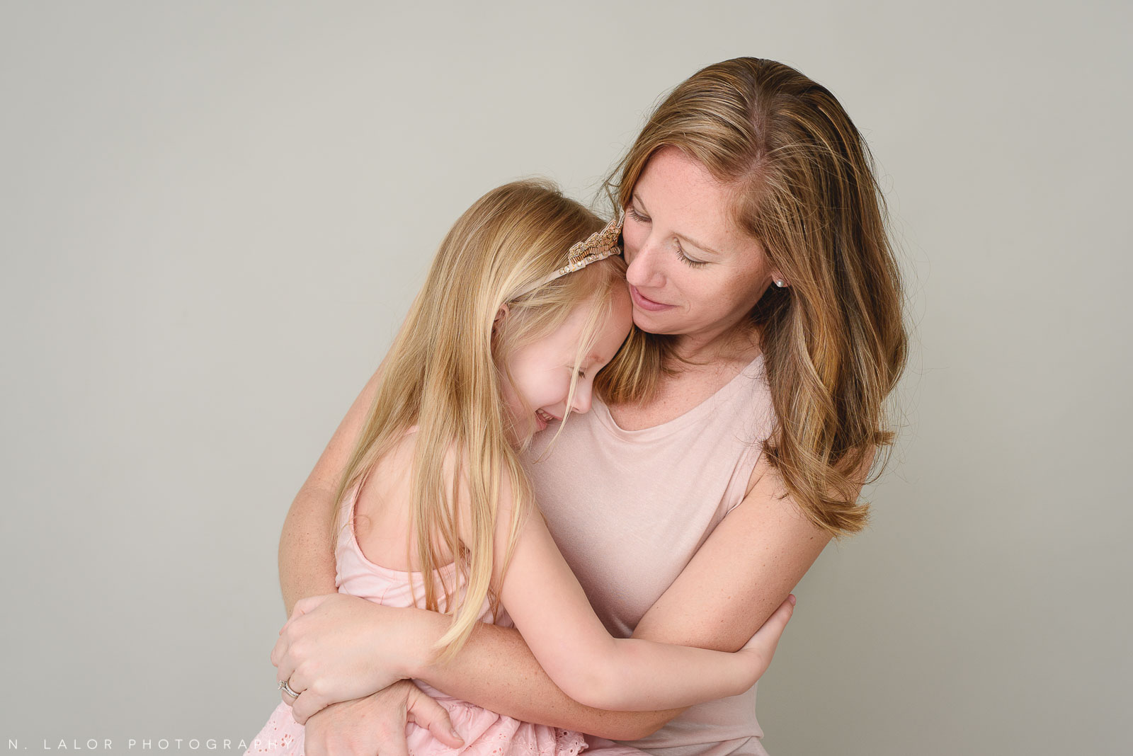 Mom and daughter. Family photo session with N. Lalor Photography. Greenwich, Connecticut studio photographer.