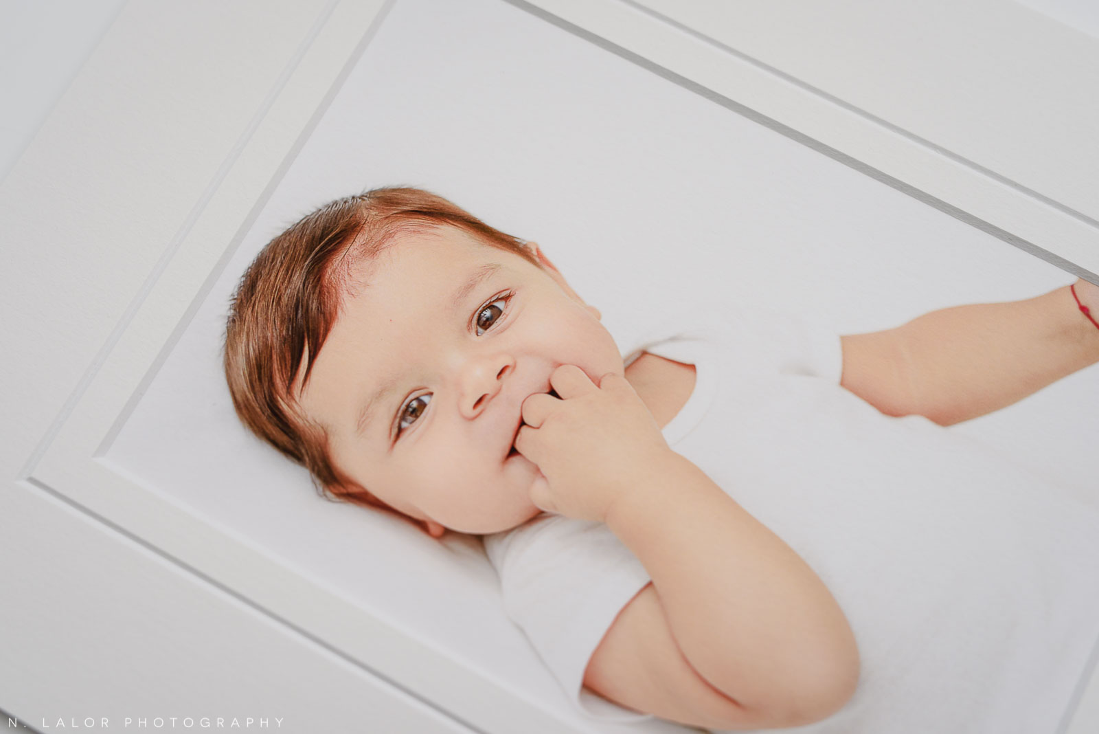 Fine art print closeup. Studio baby photo session with N. Lalor Photography. Greenwich, Connecticut.
