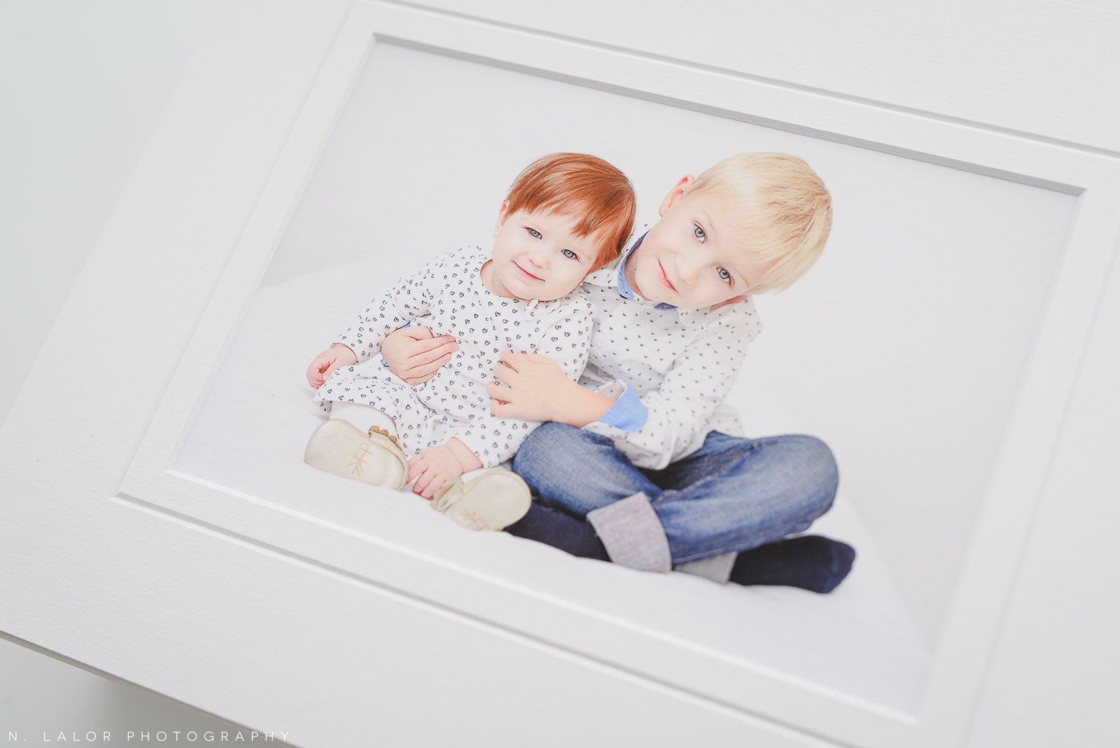 Siblings. Family portrait session with N. Lalor Photography in Greenwich, Connecticut.