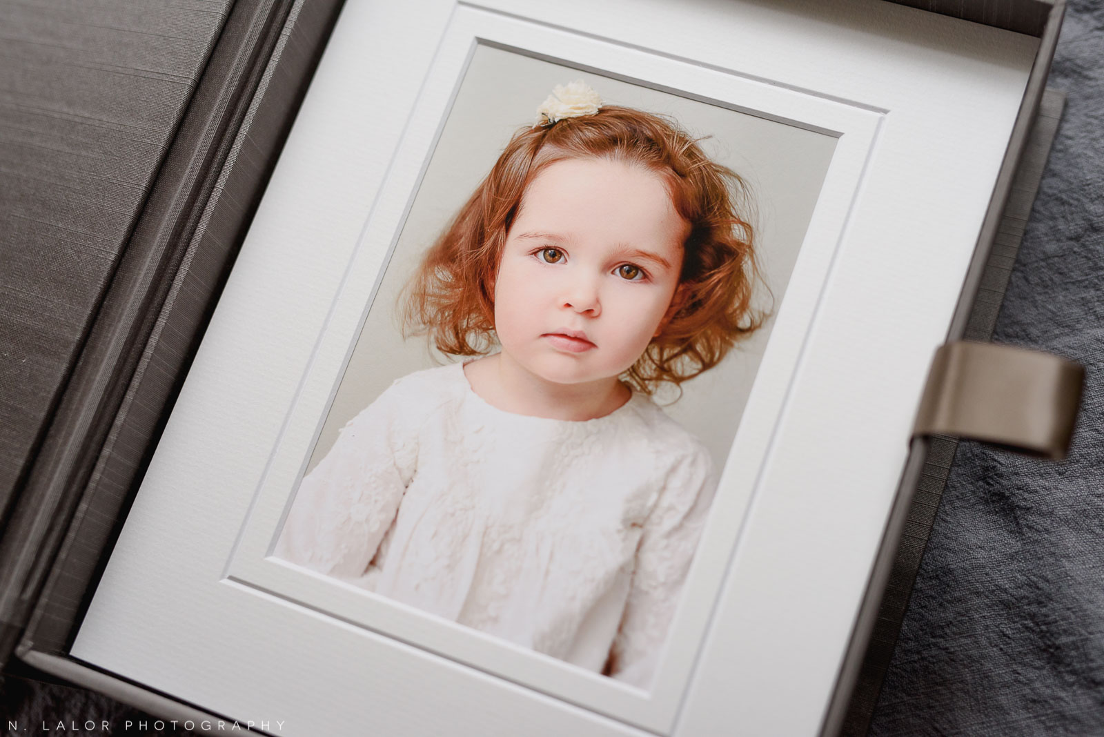 Portrait of 2-year old girl. Family photo session with N. Lalor Photography in Greenwich, Connecticut.
