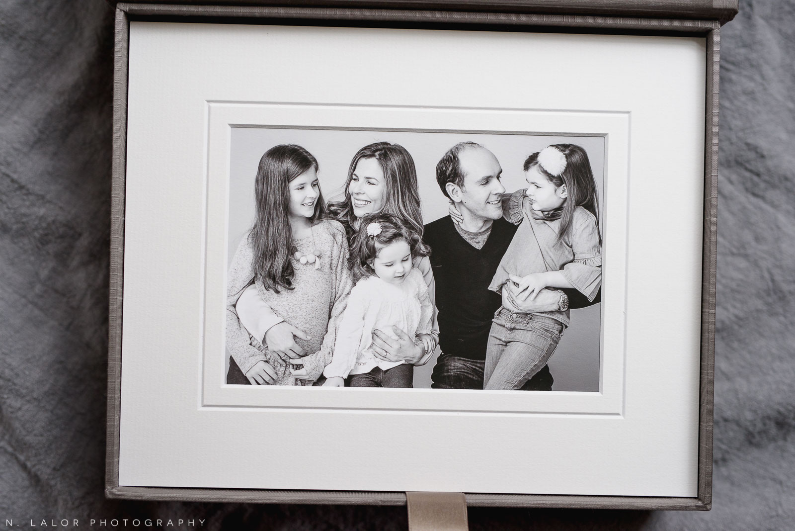 Candid family portrait. Family photo session with N. Lalor Photography in Greenwich, Connecticut.
