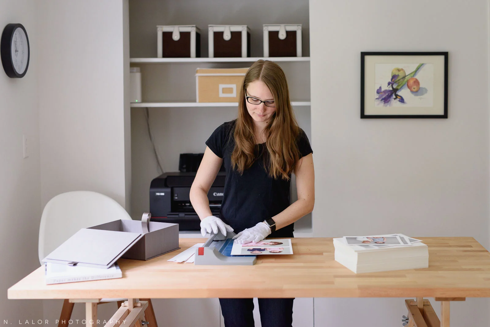 Me, going through the steps of preparing prints. 1. Cutting them down to size, 2. Matting them, and 3. Placing them into a presentation box.