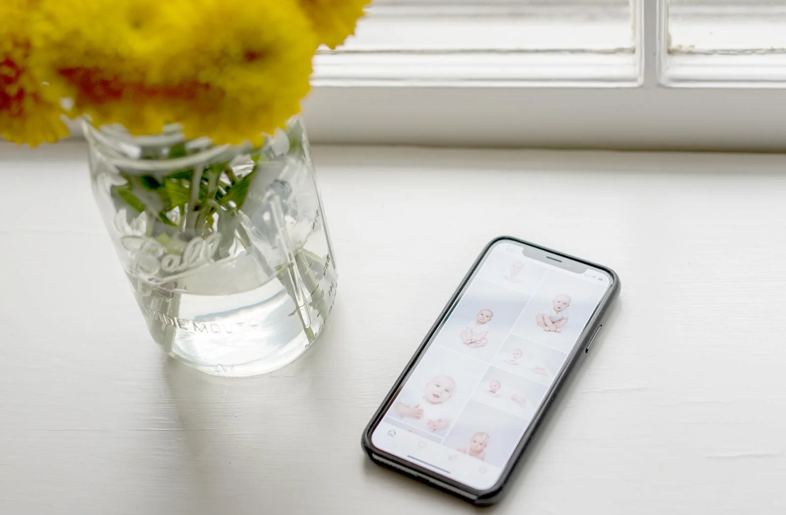Image of an iPhone showing the mobile gallery app provided by N. Lalor Photography in Greenwich, Connecticut.