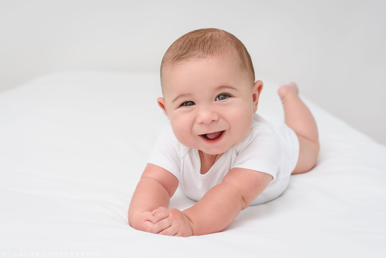 One happy baby! Portrait by N. Lalor Photography in Greenwich Connecticut.
