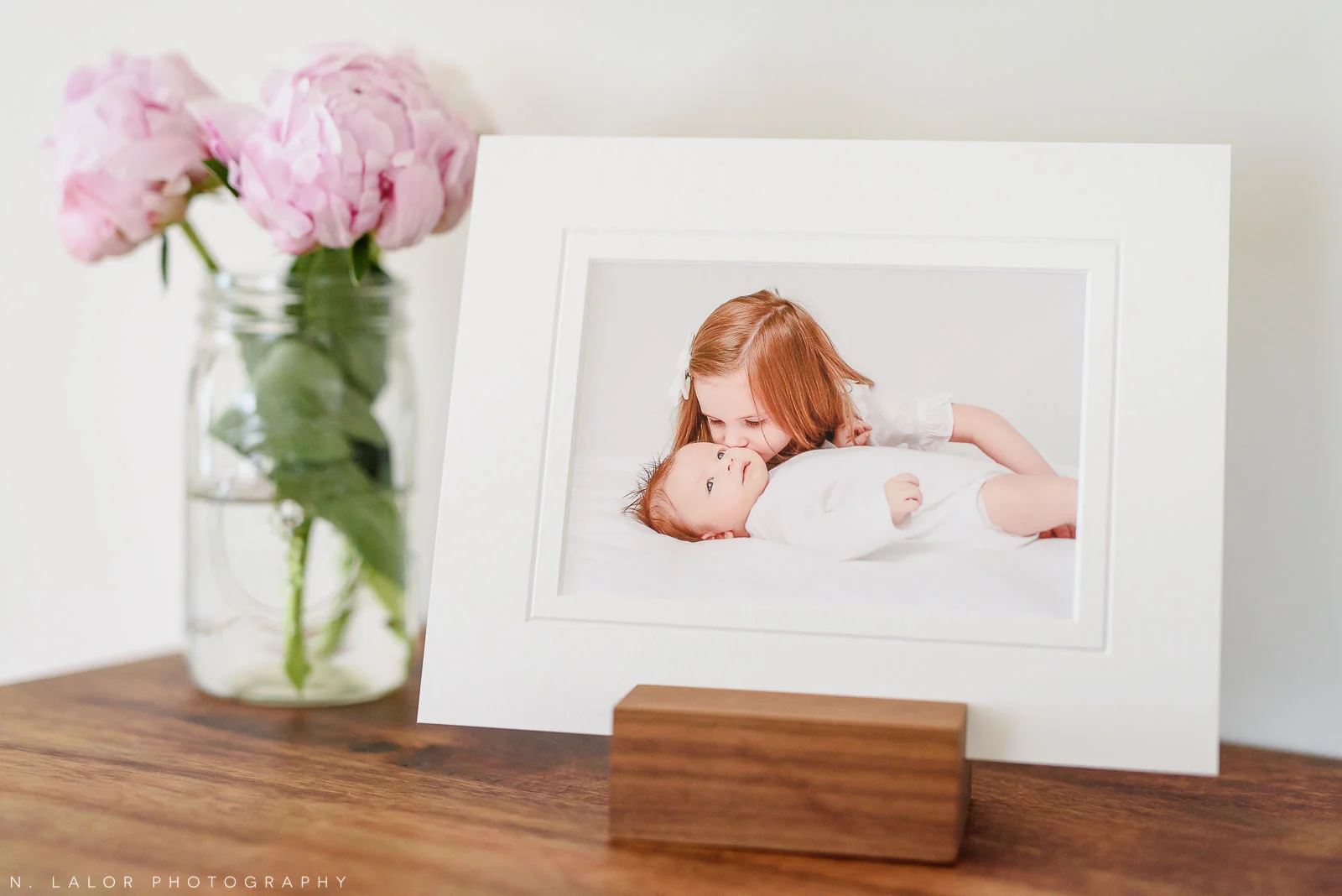 Image of a matted FineArt print on a table. Studio portrait by N. Lalor Photography in Greenwich, CT.