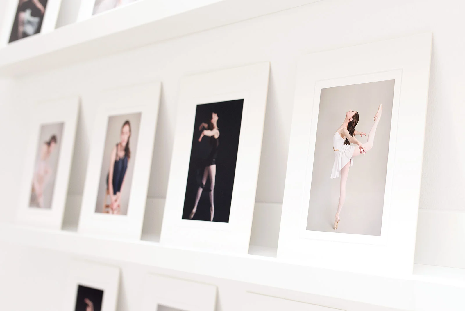 Image of printed photographs in white gallery mats. Photos by N. Lalor Photography, Studio located in Greenwich Connecticut.