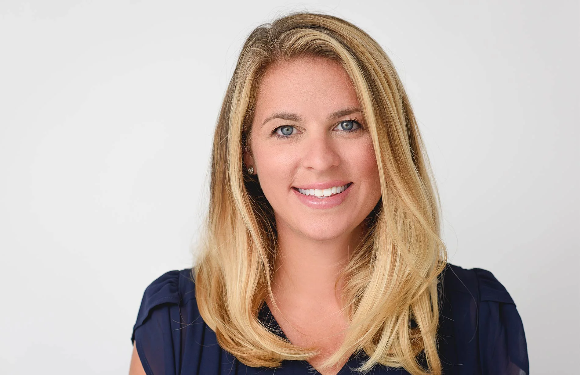 Image of a woman’s creative business headshot. Studio headshot by N. Lalor Photography in Greenwich, Connecticut.