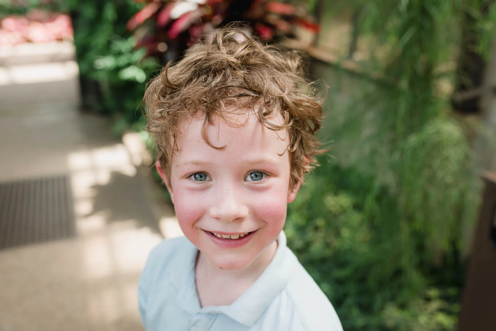 Photo of my oldest son at Longwood Gardens in Philadelphia. Be sure to diversify scenery photos with close-ups for a good variety of images.