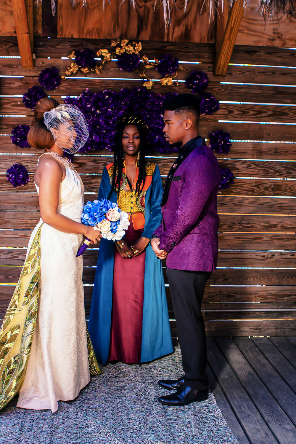 Luxe LeBlanc_Wakandan Wedding_Bride and Groom plus Officiant.jpg