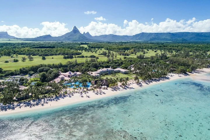 SUGAR BEACH MAURITIUS The day is made Sugar Beach is world-renowned resort located on the leeward west coast of Mauritius featuring luxury accommodation and a splendid Spa. Spread over more than 12 hectares of tastefully landscaped tropical gardens. Choose Sugar Beach to benefit from preferred access at the Ile aux Cerfs Golf Club.