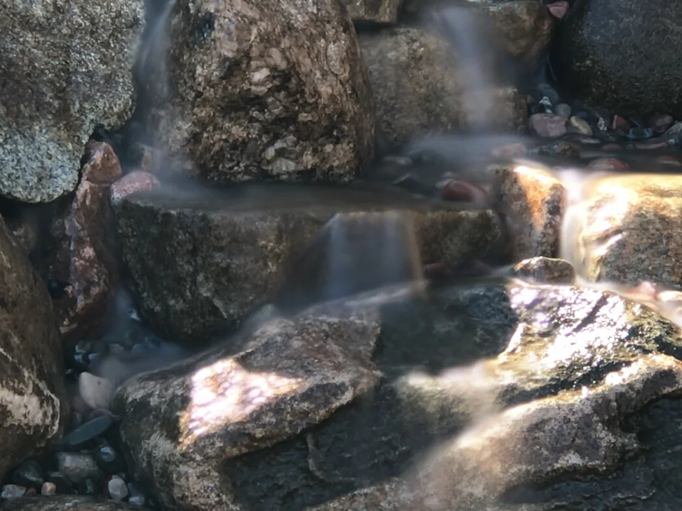 A close up of part of a pondless/pond-free waterfall in Boyne City we completed this week in only 5 hours!