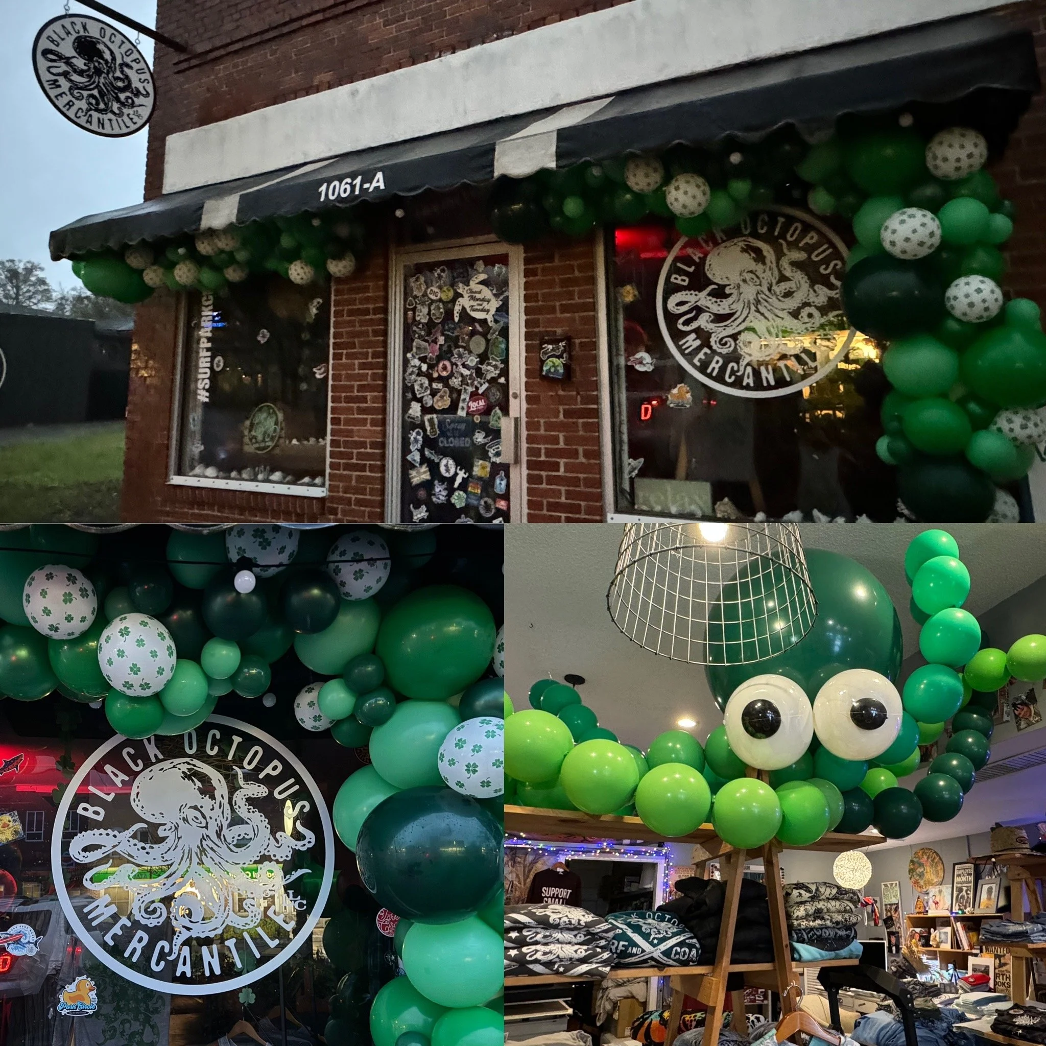 Storefront decorated with green, white, and black balloons, featuring a large green balloon octopus logo for Black Octopus Mercantile, inside and outside store front, with merchandise and decor visible.