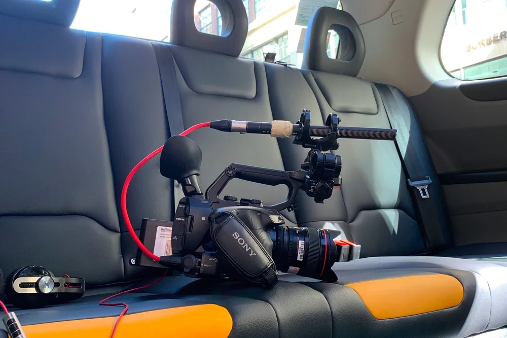 Professional internal camera rig and microphone setup inside a London black cab for dialogue recording