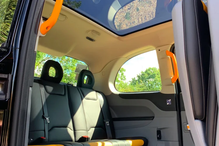 Wide interior view of a London Black Cab film set showing production space