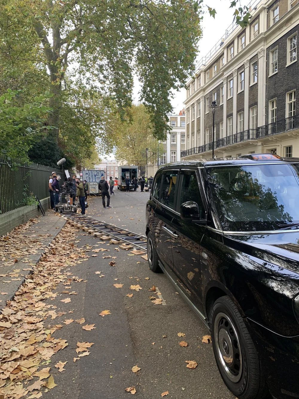 Electric TX London black cab hero car positioned on a professional film set for TV and commercial production