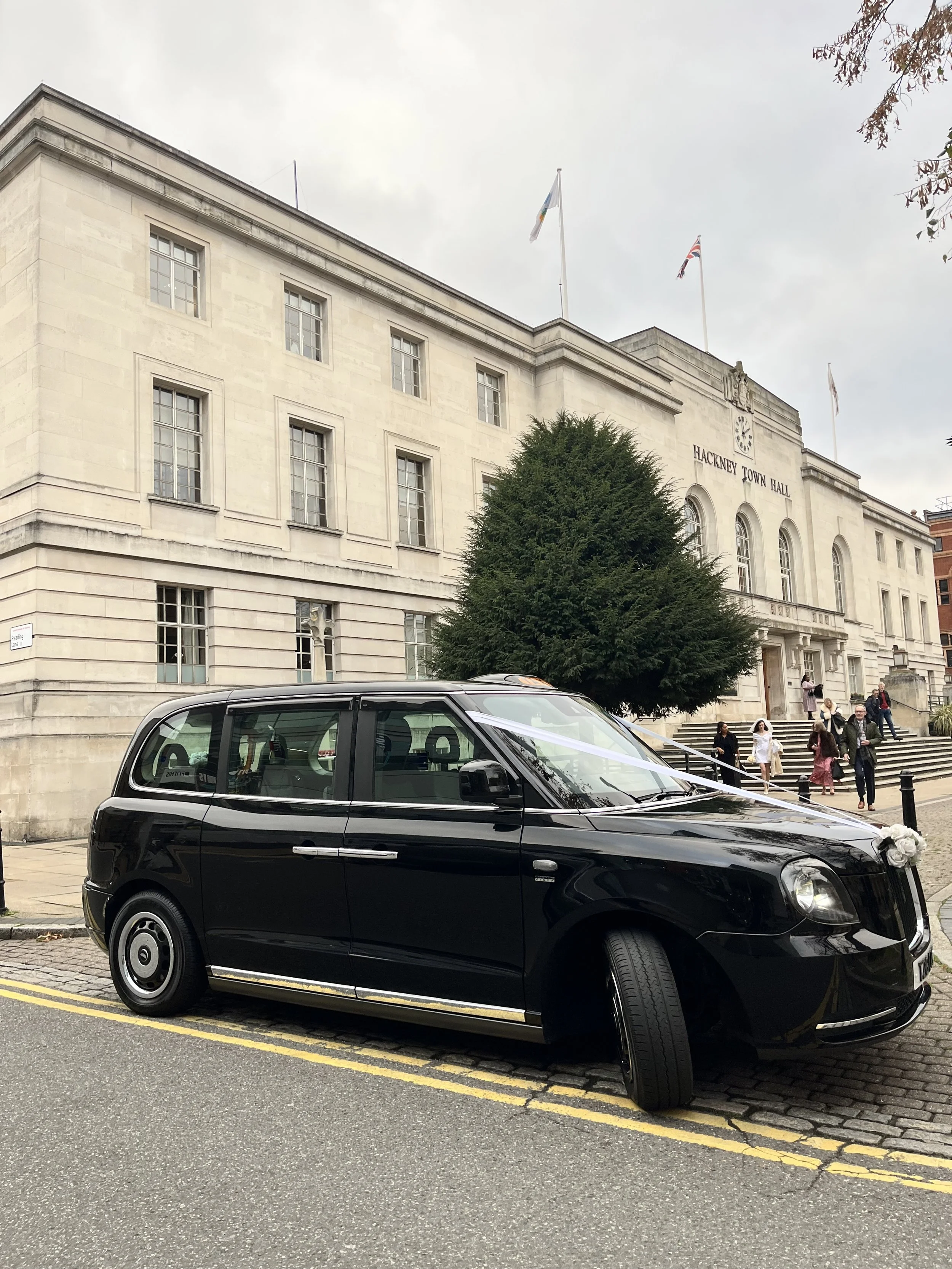 Hackney wedding black cab at Hackney Town Hall